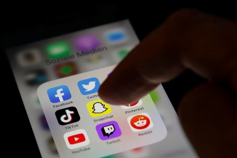 Social media icon, detailed view of a smartphone with social media apps, Facebook, Twitter,
