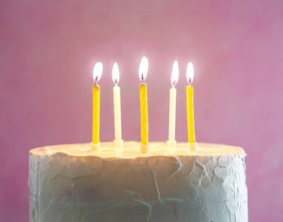 Homemade sweet cake anniversary with lighten candles