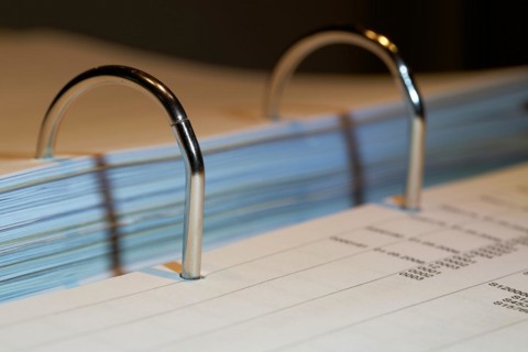 File folders on a desk in the B
