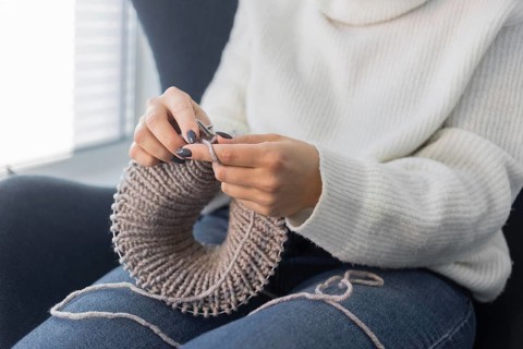 Woman home knitting close up 11