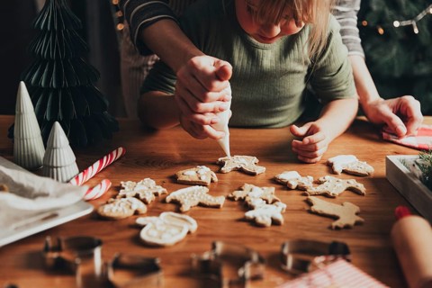 Christmas and New Year food preparation. Xmas gingerbread cooking, making and decorating freshly