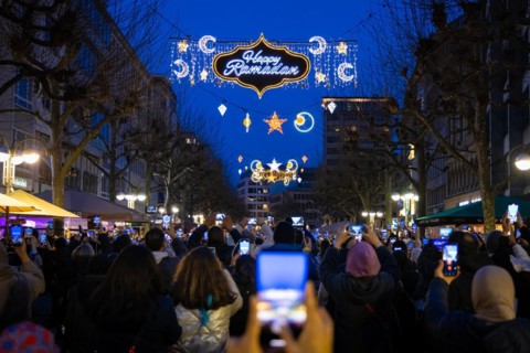 The illuminated lettering Happy Ramadan shines on the evening of 10 March 2024 as part of a light