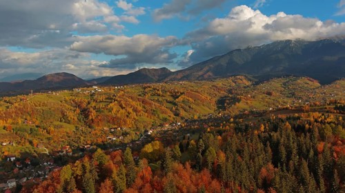 Autumn in Transylvania. Rural aerial landscape at sunset in the Carpathians mountains, Romania,