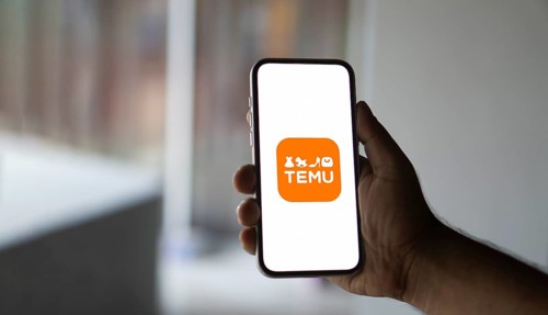 Temu logo online marketplace ecommerce on a smartphone and computer in Stuttgart, Germany.