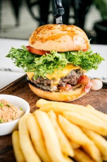 Beef burger with fries and mustard sauce set snack meal