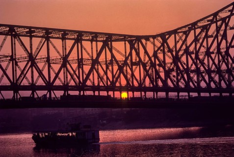 Sun set, Howrah bridge built in 1941 (Rabindra Setu) in Kolkata or Calcutta, West Bengal, India,
