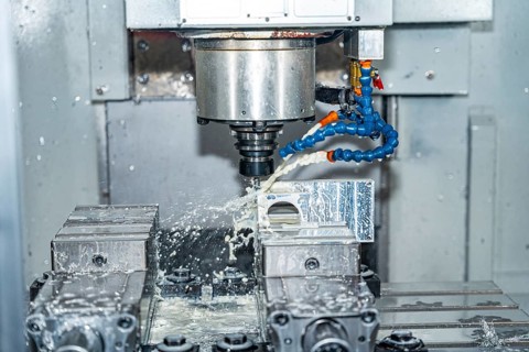 A cnc milling machine drilling a mould in a modern factory