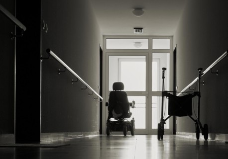 Lonely corridor with rollator in a retirement home