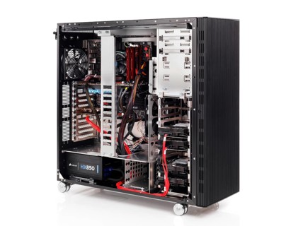 PC computer open ATX case with motherboard and other hardware installed isolated on white