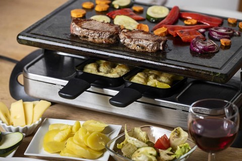 Swiss raclette with meat and vegetables