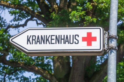 Arrow signpost to a hospital, Lilienthal, Lower Saxony, Germany, Europe