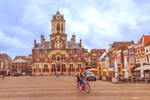 Delft, Netherlands, April 6, 2016: City Hall and Market Square Markt