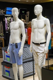 Two white male fashion mannequins with shorts in a fashion shop, Allgäu, Bavaria, Germany, Europe