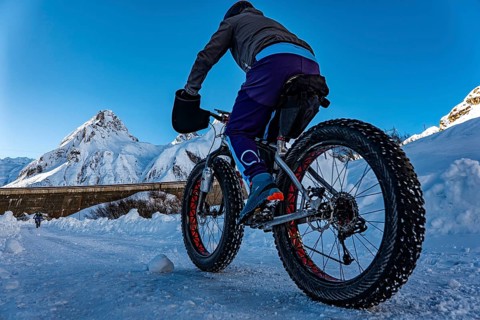 Mountain bike in the alps in the snow