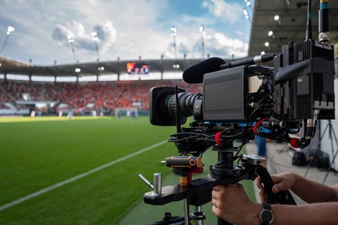TV camera on the stabilizer at football stadium