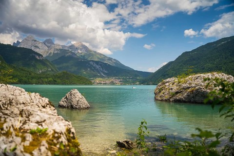 Lake Molveno is nestled between mountains in the Dolomites, Italy, Europe