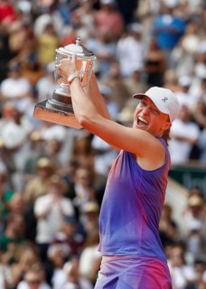 French Open 2024 Champion Iga Swiatek of Poland is holding the trophy at Roland Garros, Paris,