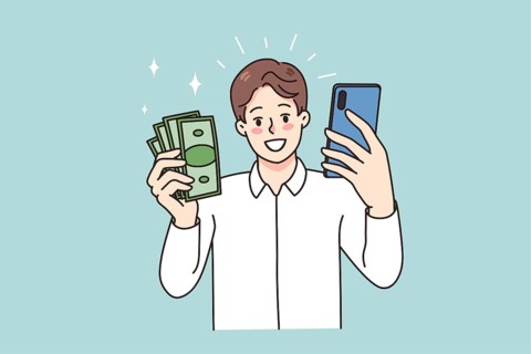 Smiling man holding smartphone and money excited with online lottery victory. Happy guy win cash on