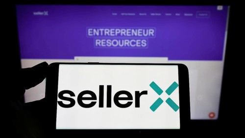Stuttgart, Germany, 05-08-2022: Person holding mobile phone with logo of e-commerce company SellerX