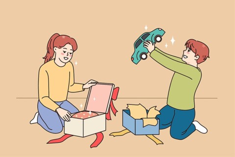 Happy small kids unpack wrapped boxes with presents for birthday. Smiling children feel excited