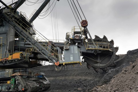 Coal mining in rainy day