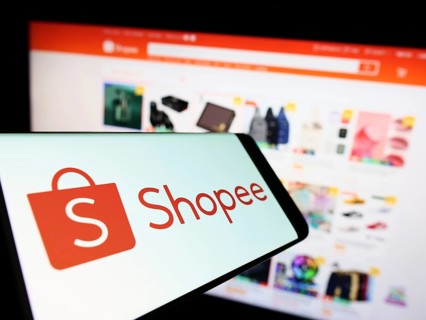 Stuttgart, Germany, 09-10-2022: Cellphone with logo of Singaporean e-commerce company Shopee on