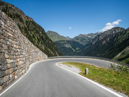 Tight bend, Alpine peaks behind, Silvretta High Alpine Road, Vorarlberg, Austria, Europe