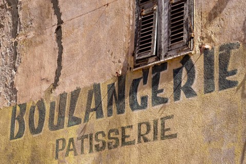 Painted lettering Boulangerie Patisserie on an old building, Corsica, France, Europe