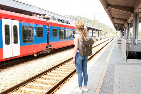 Traveller woman train station