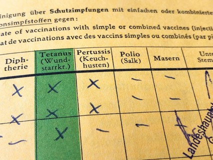 German international certificate of vaccination with missing records for measles and polio