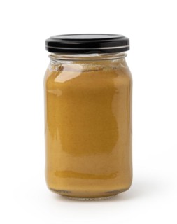 jar of mustard isolated on white background with clipping path