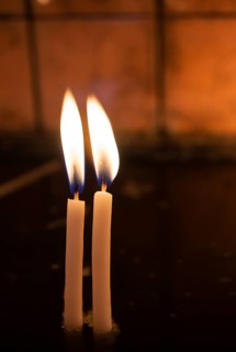 Burning candle making light in view