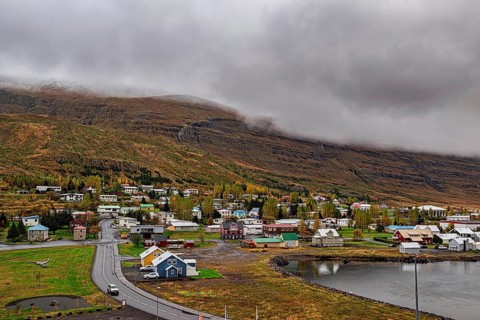 Scenic view of small town Seydisfjordur on Eastside of Iceland in a cloudy day