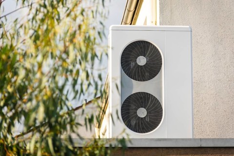 A heat pump on the roof of a garage in Langenfeld, Germany, Europe