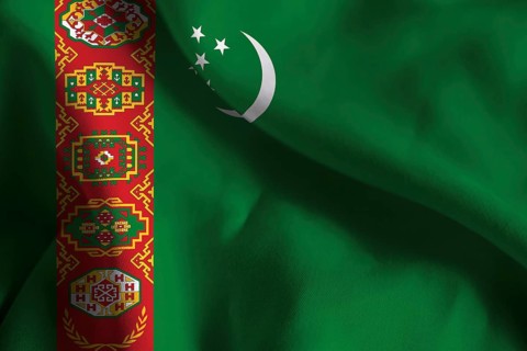 A ruffled fabric flag of Turkmenistan