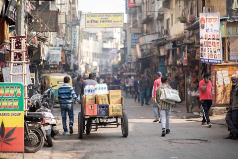 Delhi, India, December 04, 2019: People on busy street at Main Bazaar in Paharganj district, Asia