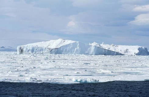 Ice Field with Iceberg in Antarctica