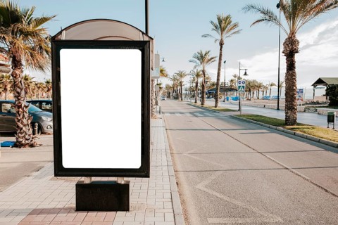 Blank white bus stop box sunlight