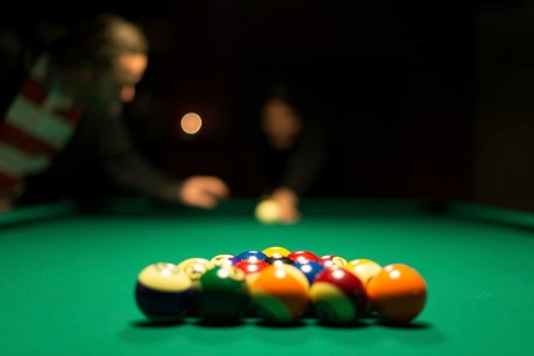 Racked and ready billiards balls