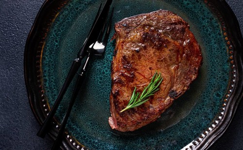 Food, Grilled steak, beef steak, rib eye steak, on a plate, top view, no people