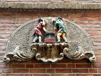 Amsterdam, Netherlands. June 23, 2023. A gablestone of a blacksmith's shop in Amsterdam