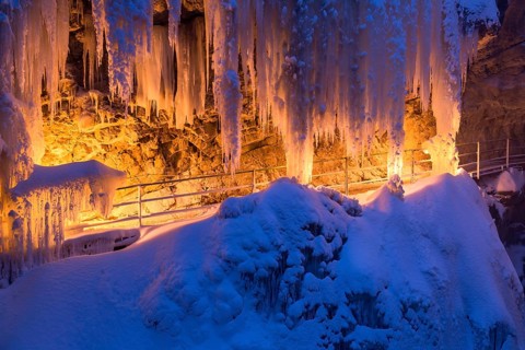 Breitachklamm gorge in winter by torchlight