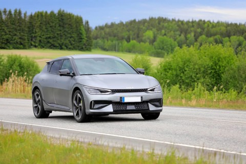 Silver Kia EV6 battery electric car at speed on highway