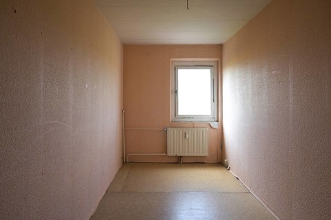 Cramped unrenovated room intended as enough space in a typical rental apartment in social housing