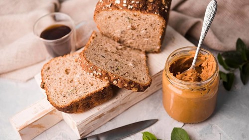 Close up peanut butter with homemade bread