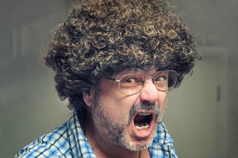 Angry pensioner with a wild wig