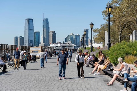 New York, United States of America, September 19, 2019: People enjoying the sunshine on the