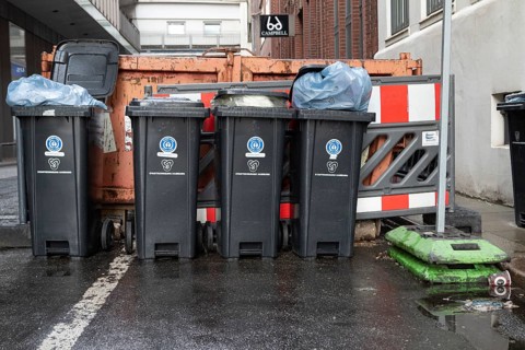 Symbolic image, city cleaning, waste disposal, recycling, bins for residual waste filled with