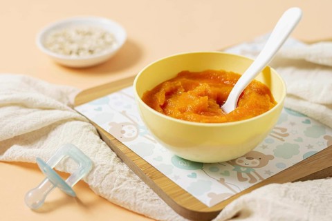 High angle yellow bowl with baby food. Resolution and high quality beautiful photo