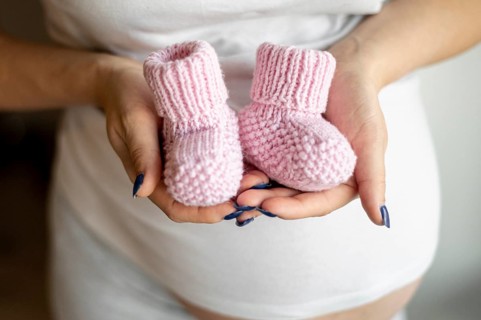 Close up view pink baby shoes
